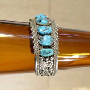 Cuff.  Sterling silver and turquoise cuff.