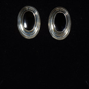 Silver and onyx earrings.