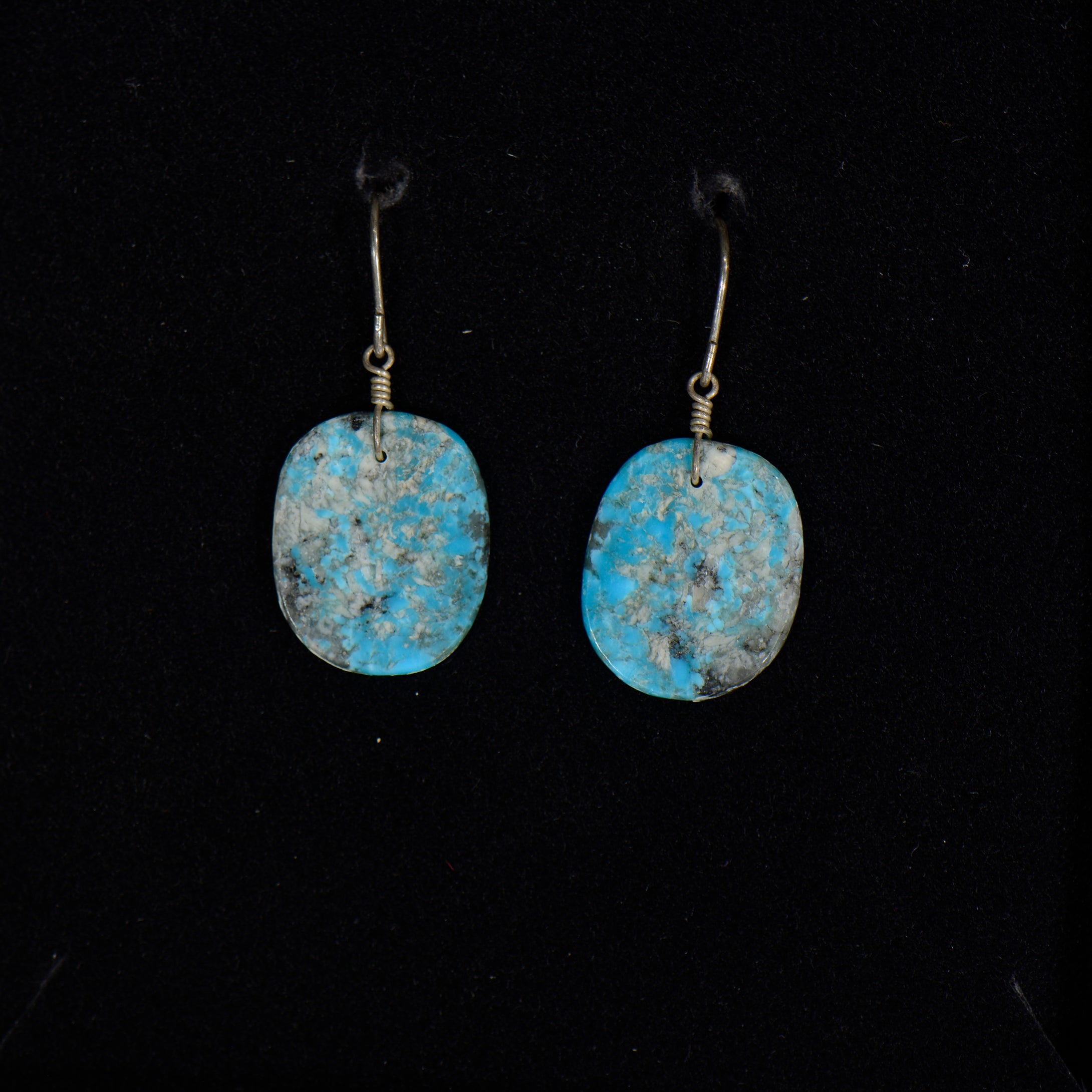 Silver slab turquoise earrings.