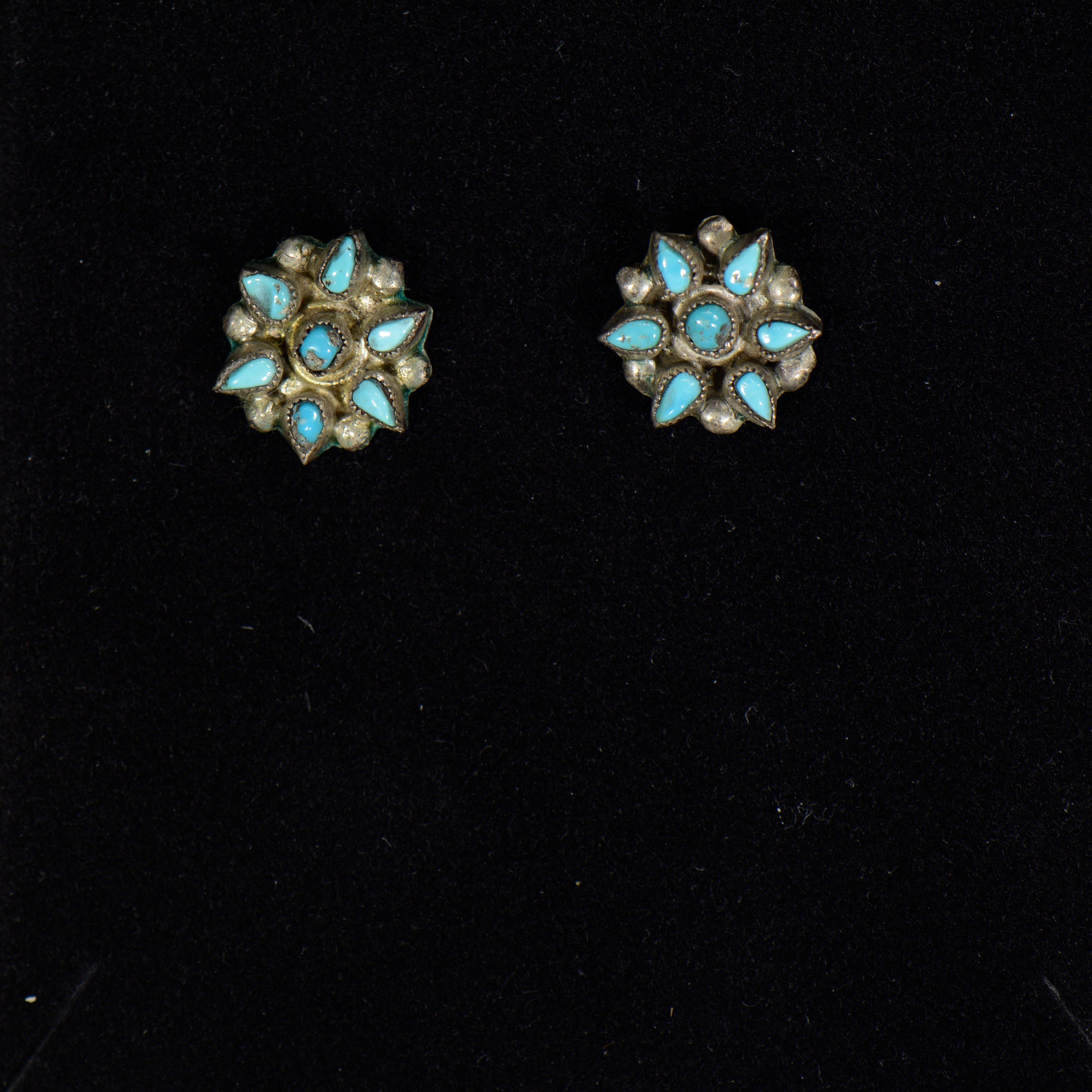 Silver and turquoise earrings.