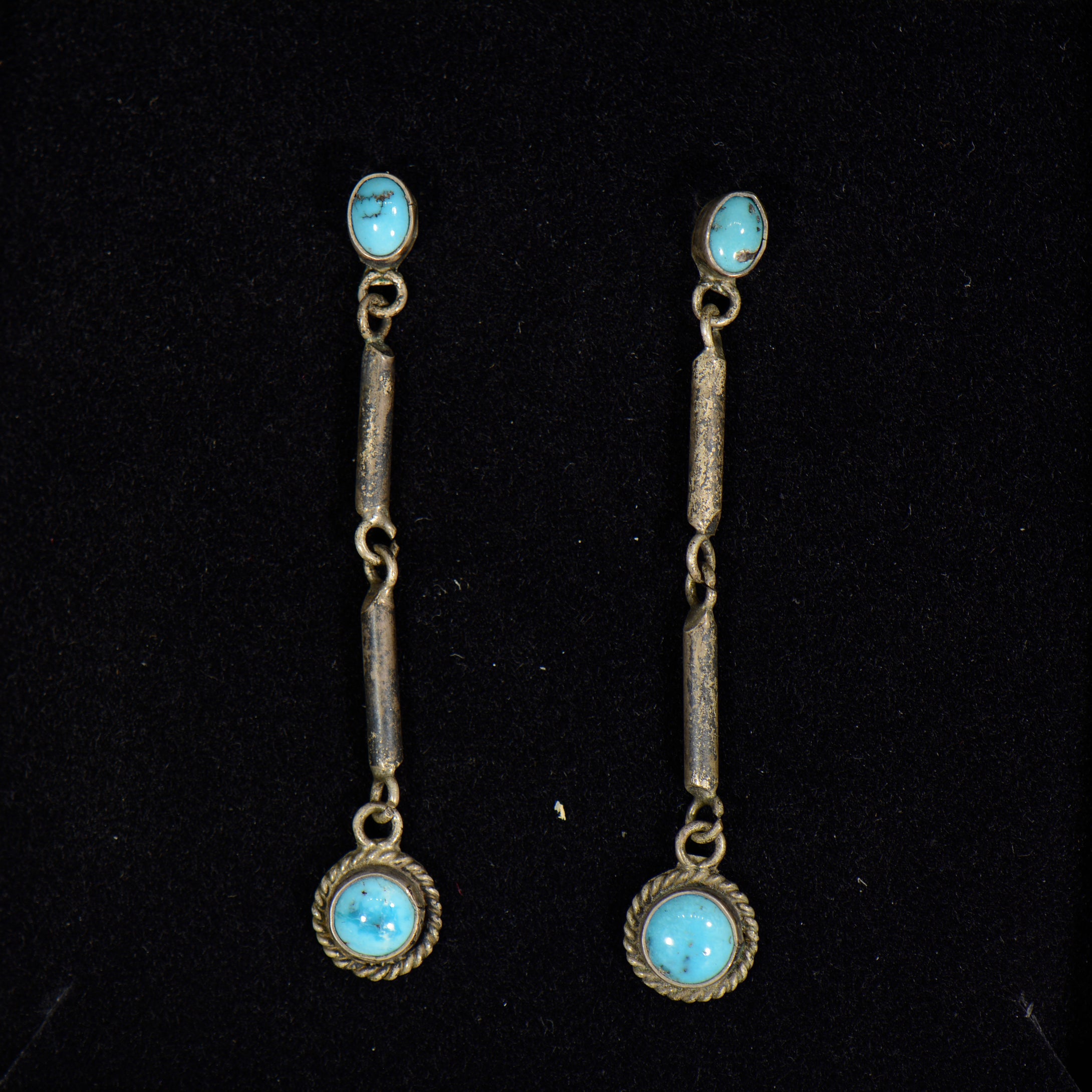 Silver and turquoise earrings.
