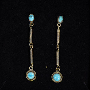Silver and turquoise earrings.