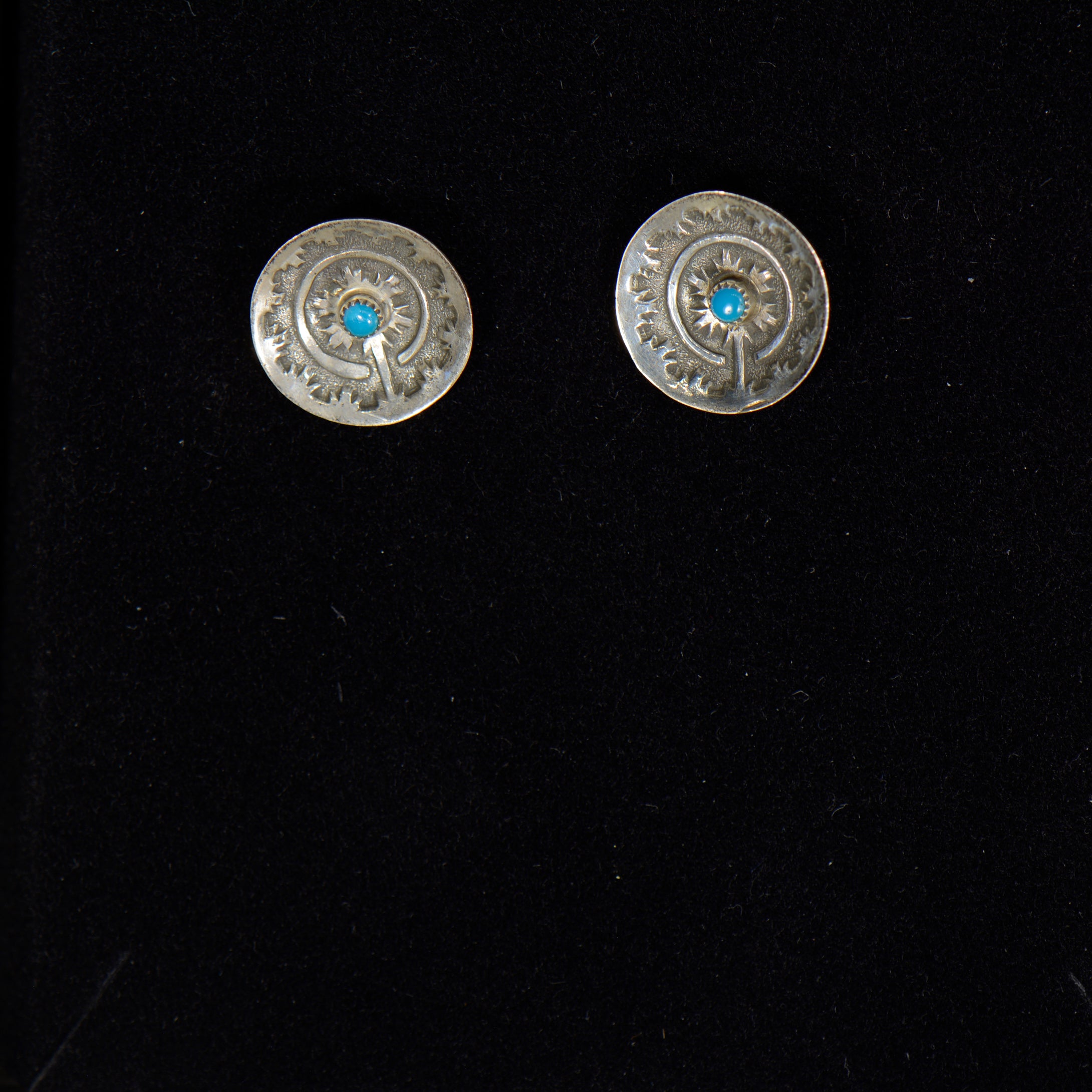 Silver and turquoise earrings.