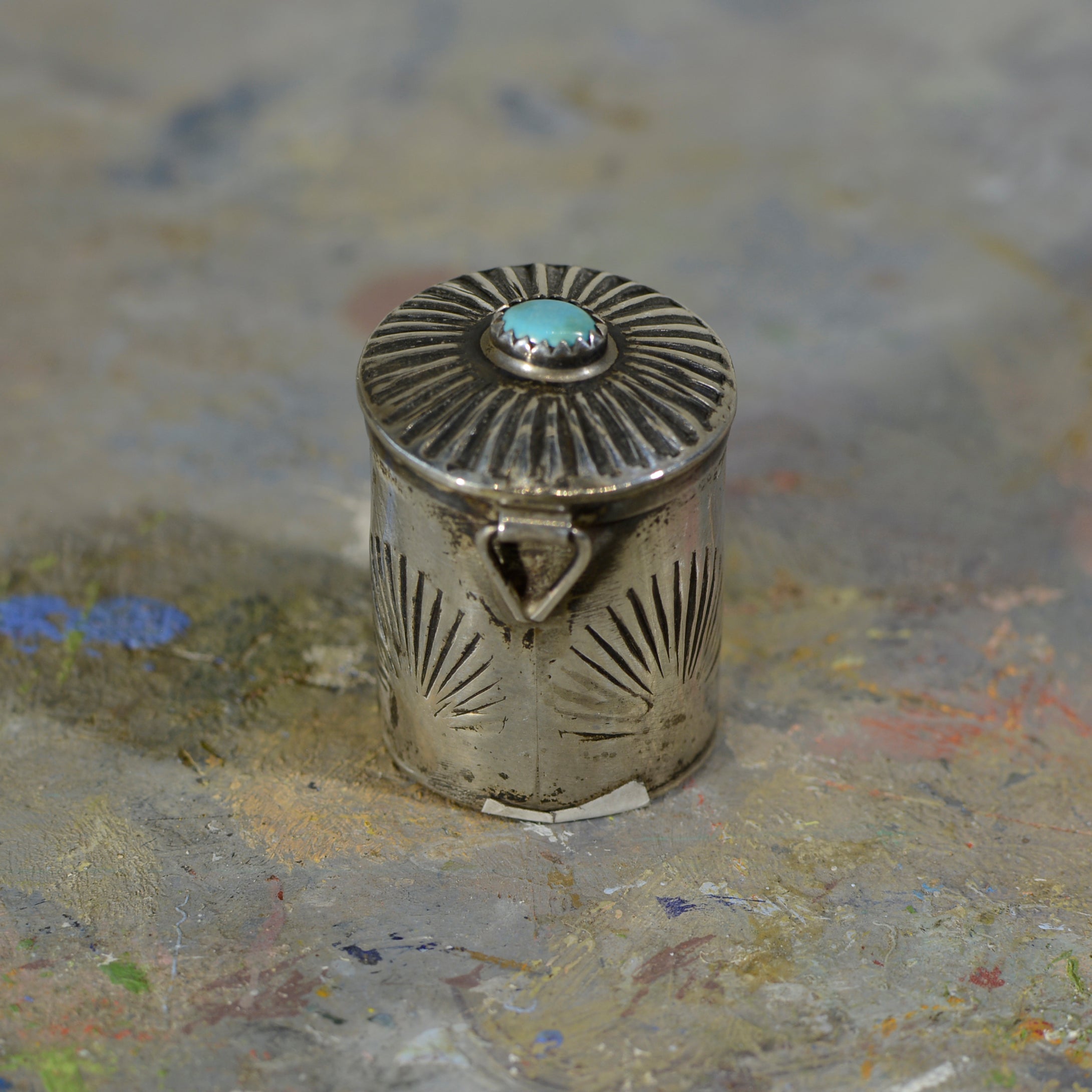 Silver and turquoise box.