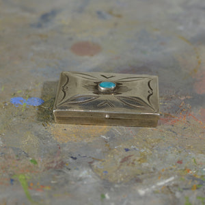 Silver and turquoise box.