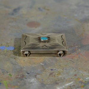 Silver and turquoise box.