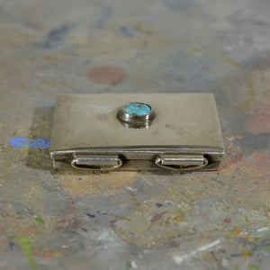 Silver and turquoise box.