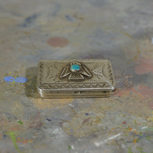 Silver and turquoise box.