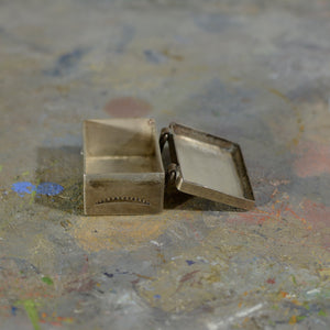 Silver and turquoise box.