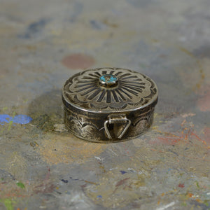 Silver and turquoise box.