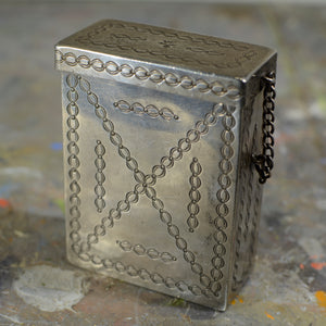 Silver and turquoise cigarette case.