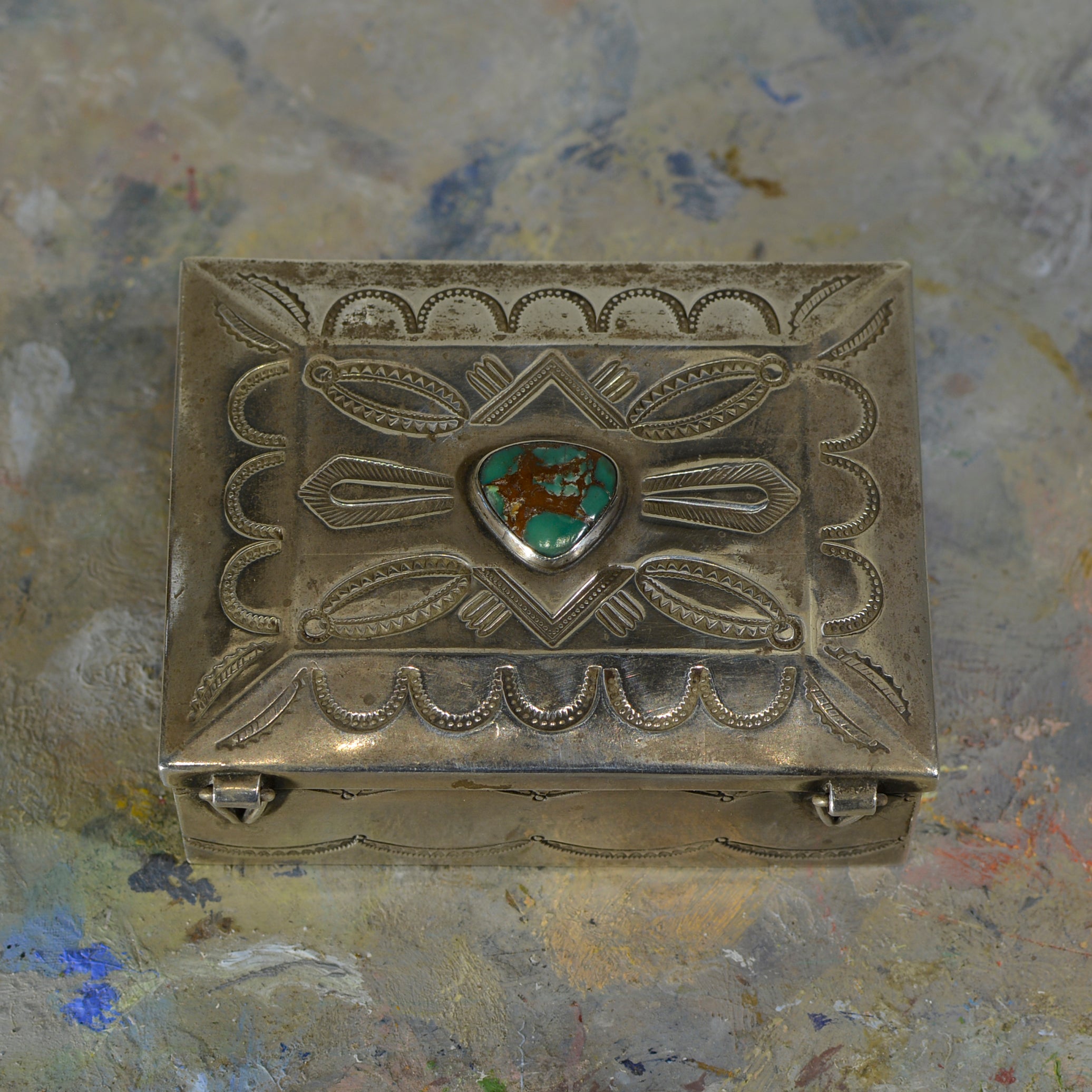 Silver and turquoise box.