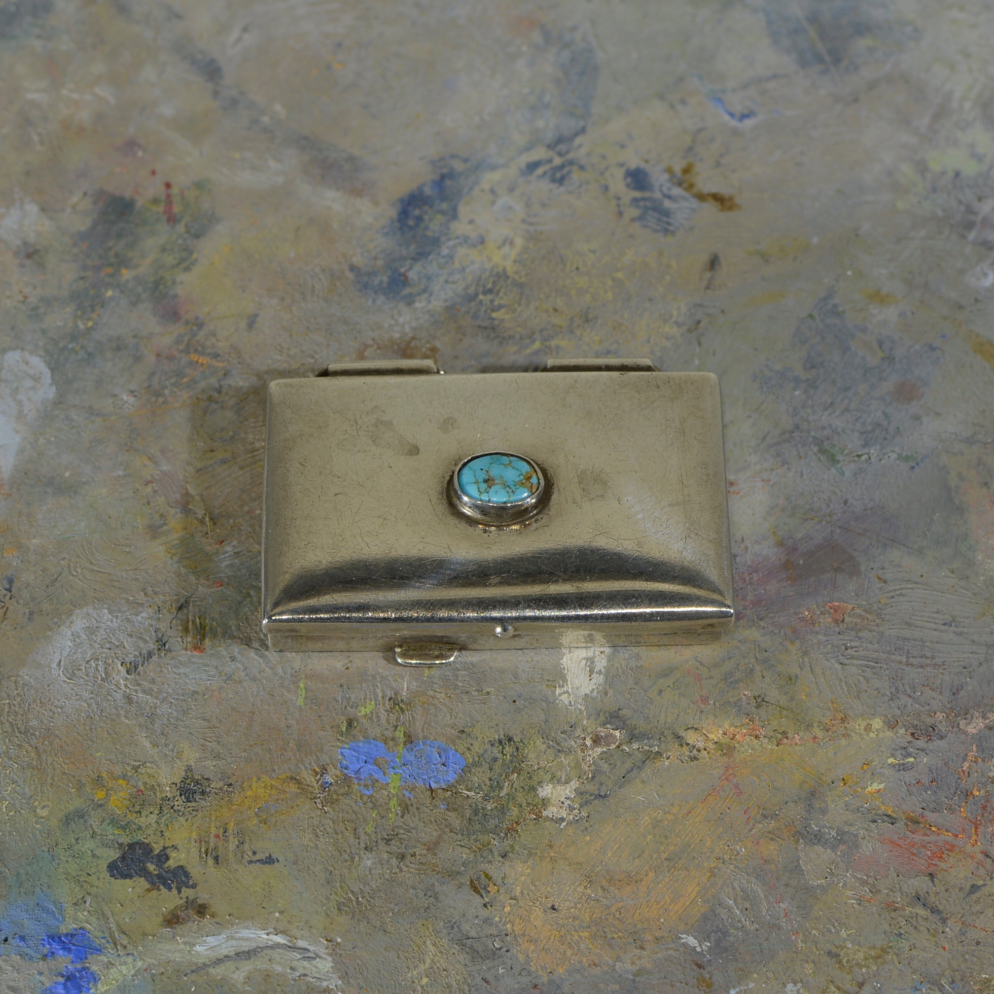 Silver and turquoise box.