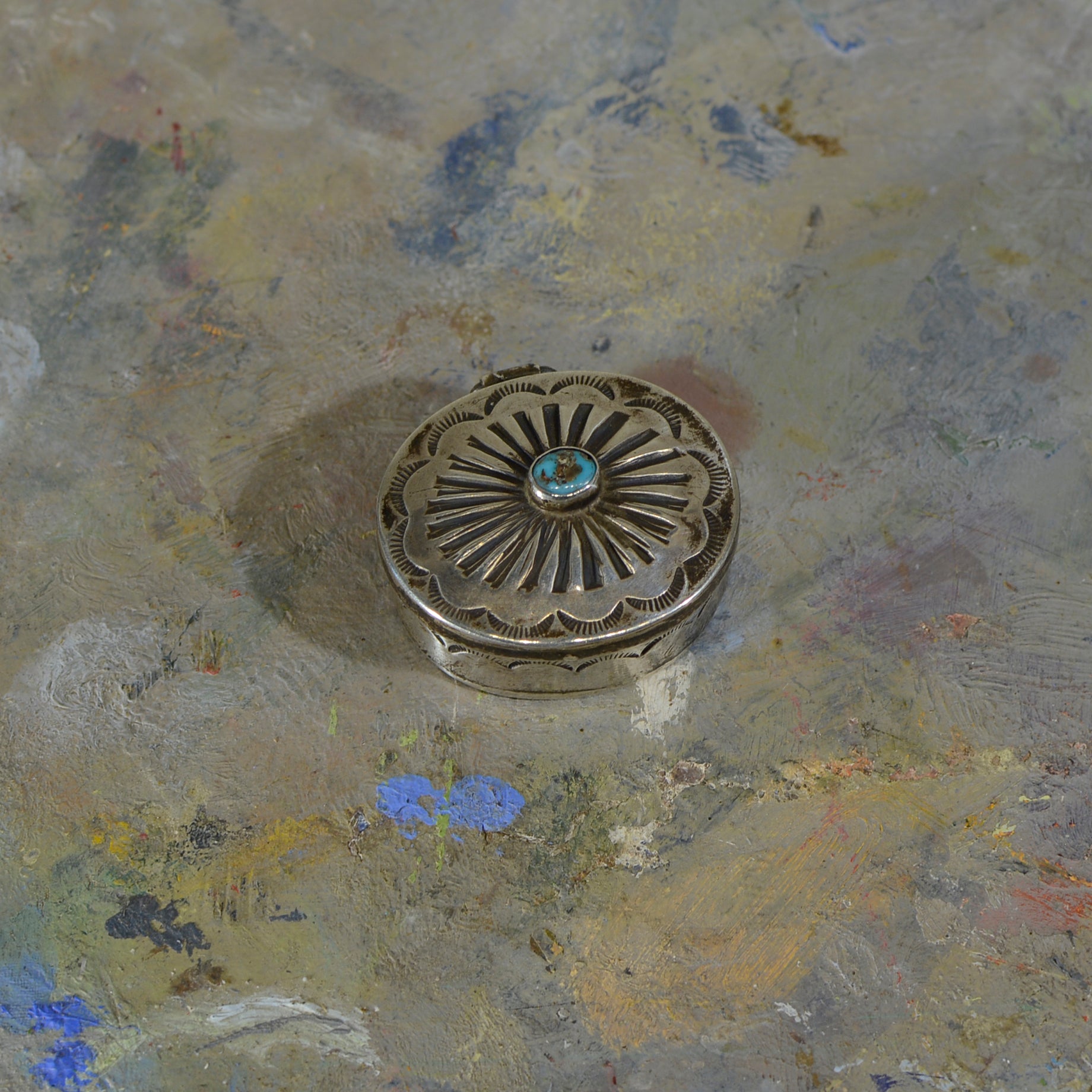Silver and turquoise box.