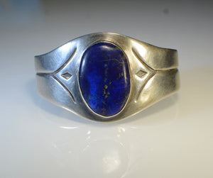 Bracelet.  Silver and lapis bracelet.