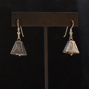 Silver earrings.