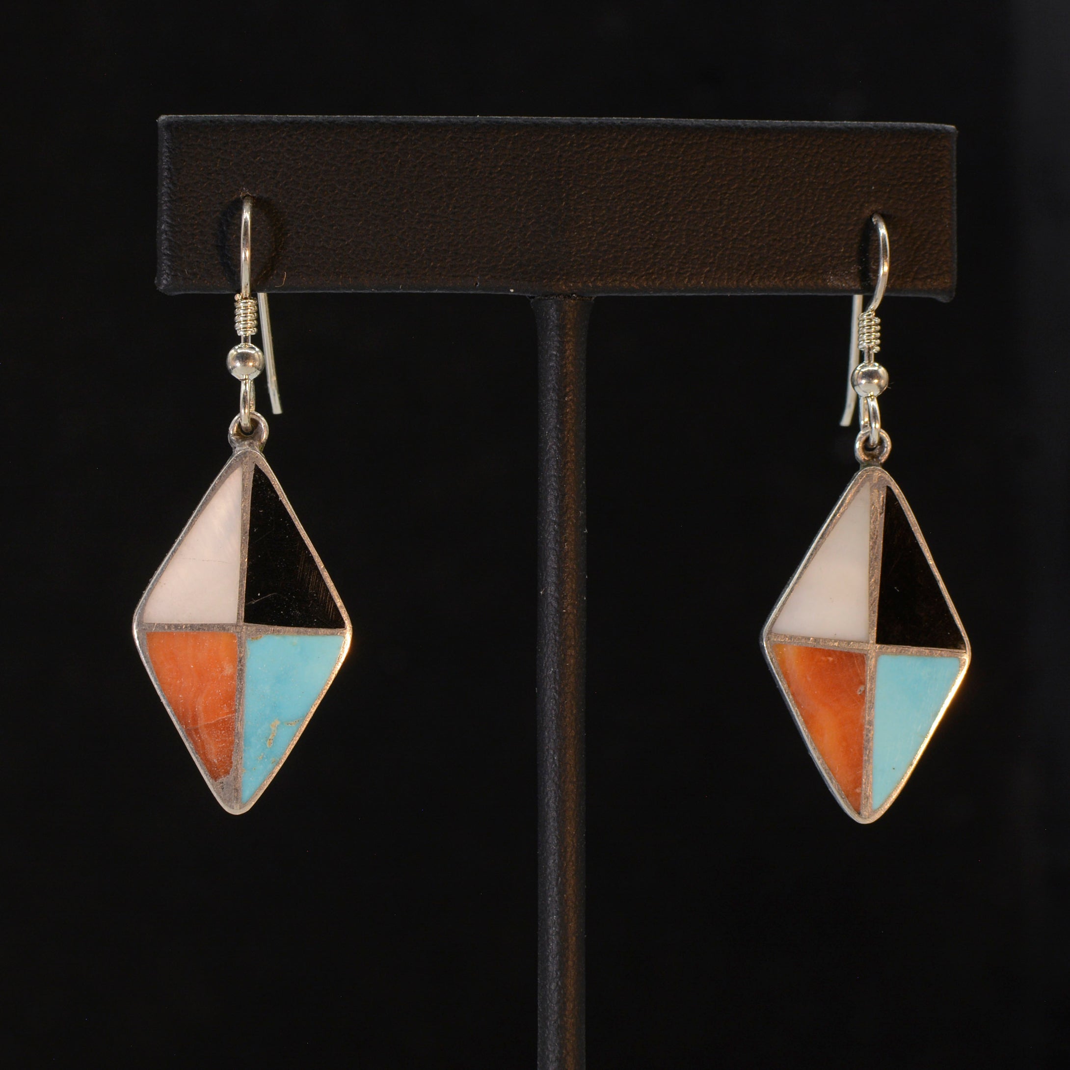 Silver earrings.