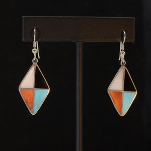 Silver earrings.